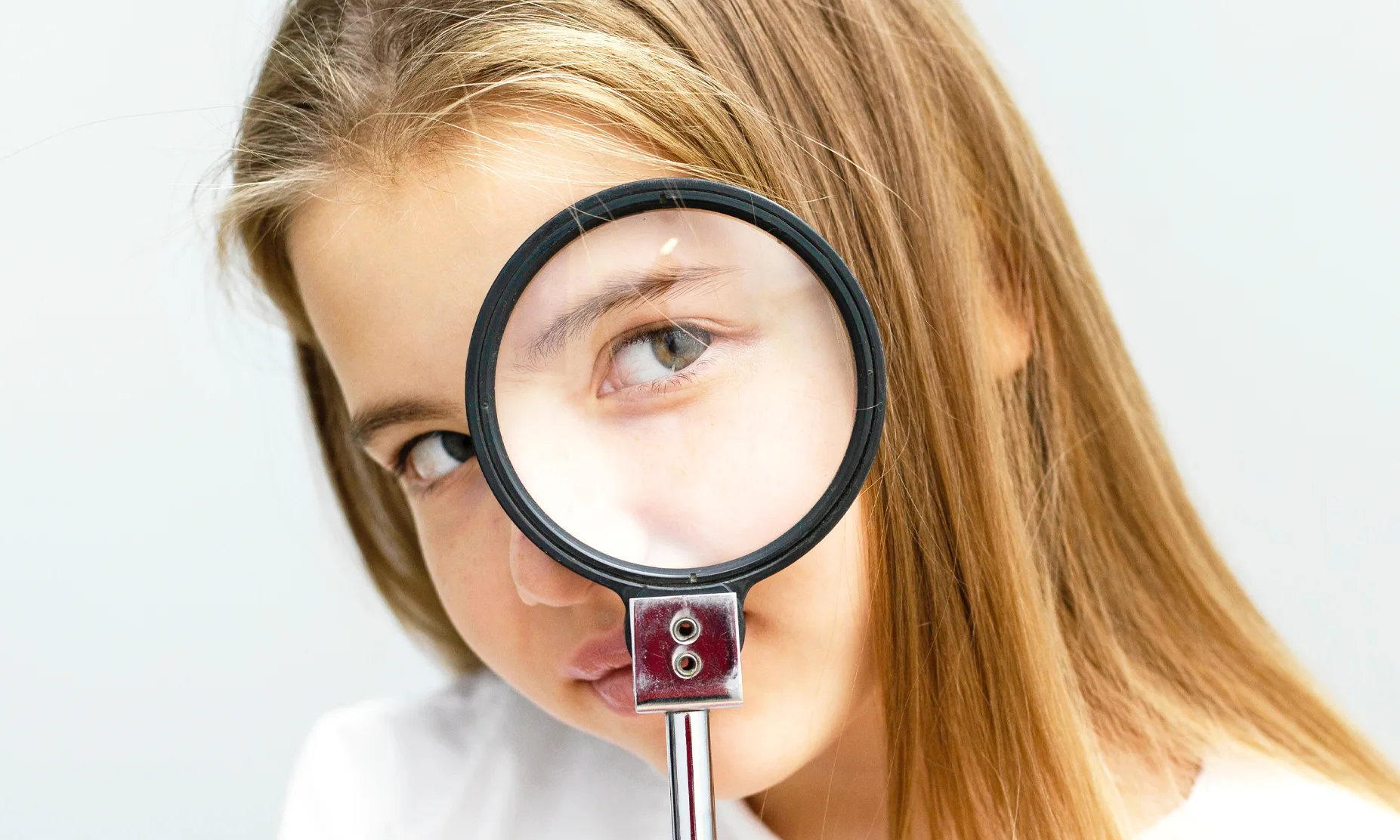 front-view-girl-scientist-holding-magnifying-glass